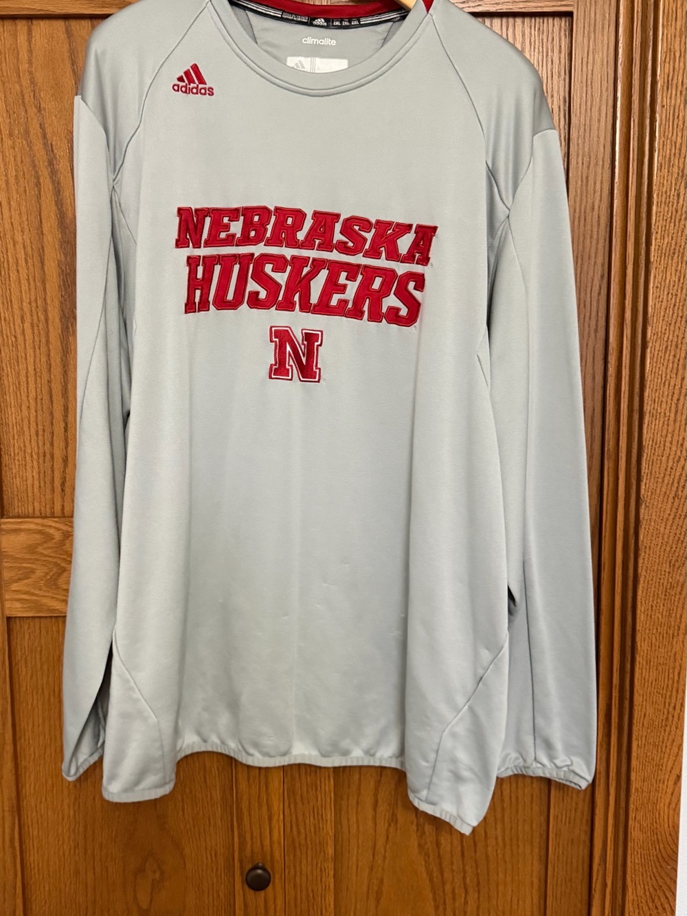 adidas Light Gray Long Sleeve Nebraska Huskers Pullover with Red Logo